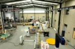 Automation Stretch Wrapping Robot Palletizing System with Pallet Dispenser Conveyors - Image 7